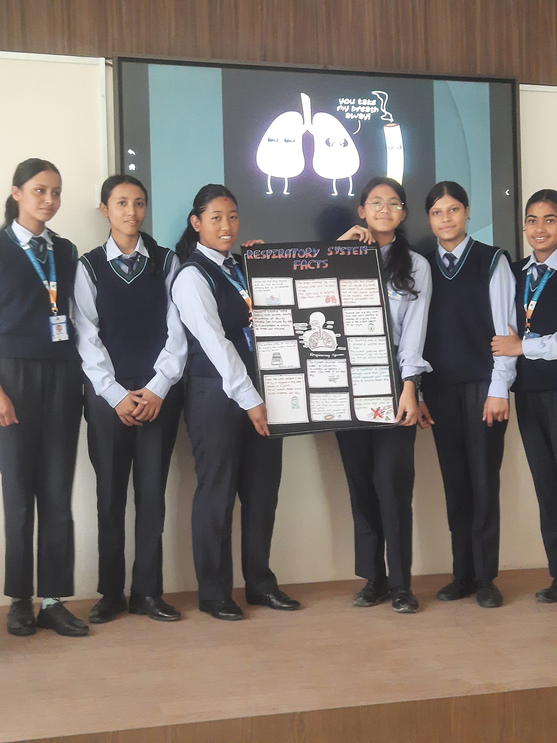 student showing their biology project work